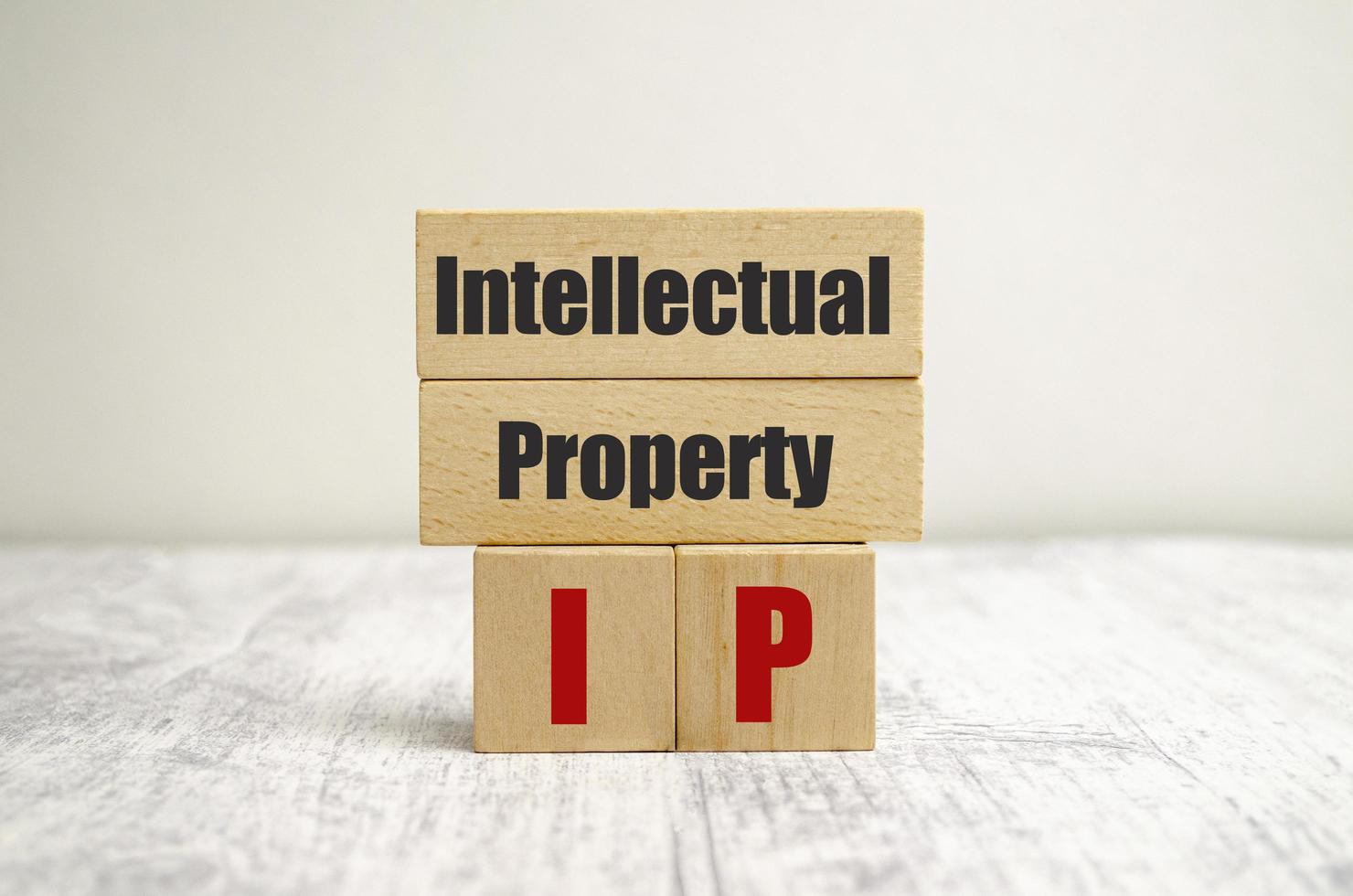 on-the-wooden-blocks-with-the-inscription-intellectual-property-free-photo